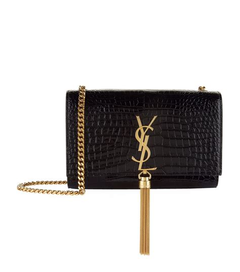 ysl black bag gold logo|YSL black bag with tassel.